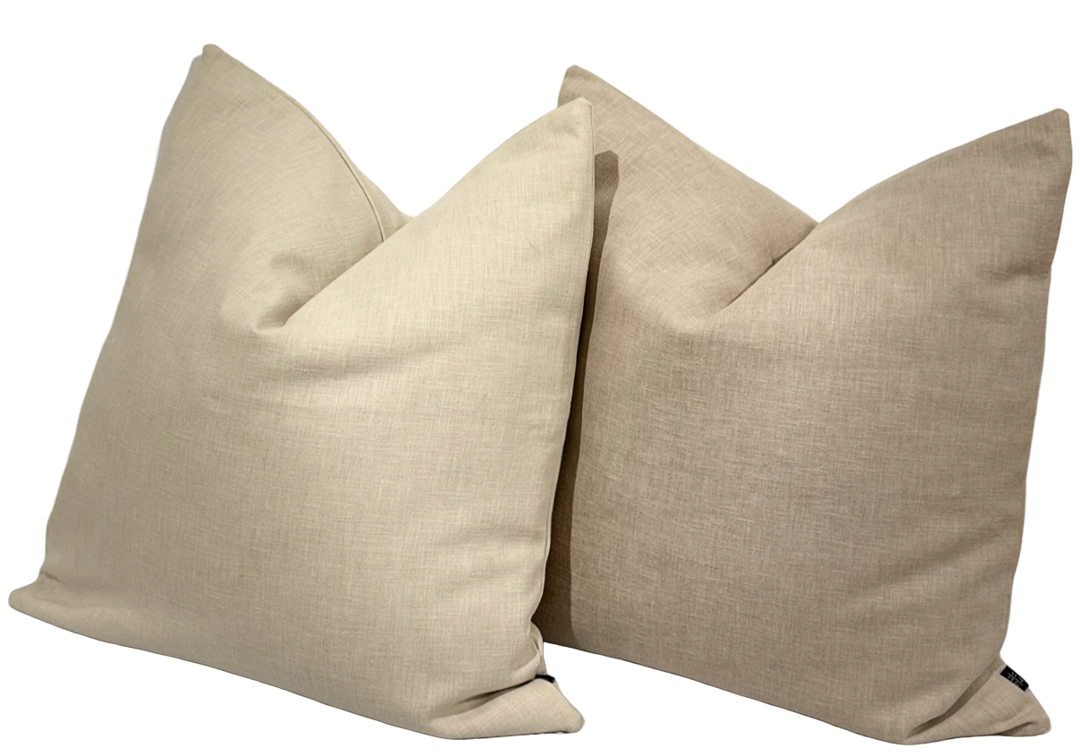 Stonewashed beige cushion in front styled with desert sand cushion at the back, showcasing layered neutral tones for versatile interior styling | interiors by zai