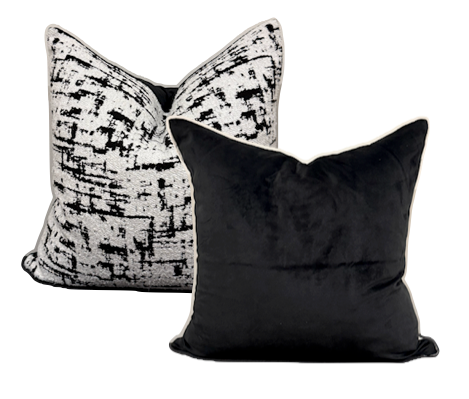 Monochrome muse cushion with velvet back and feather insert.