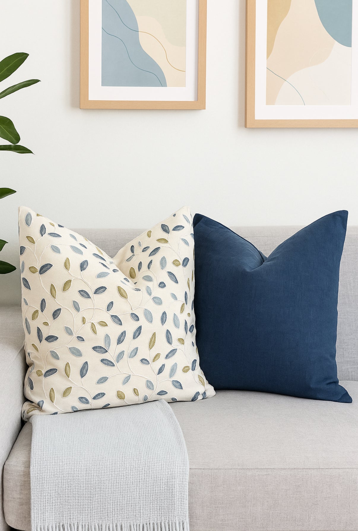Azure Olive Cushion paired with ink blue cushion for contrast in modern interior space