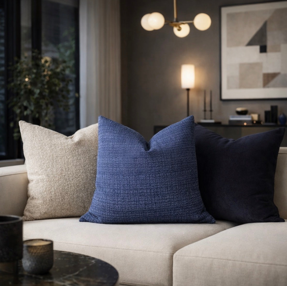 
designer blue cushion styled on bed | Atlantic Blue