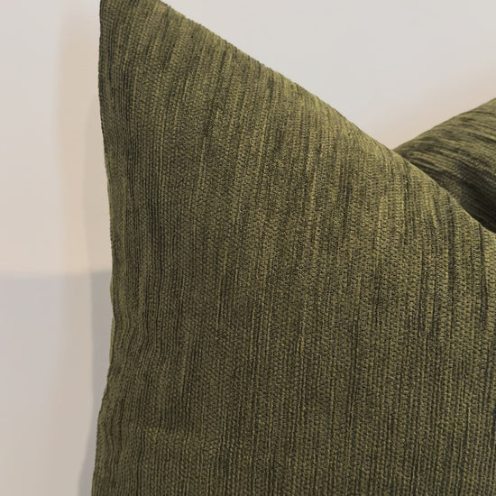 Close up olive green cushion fabric texture detail