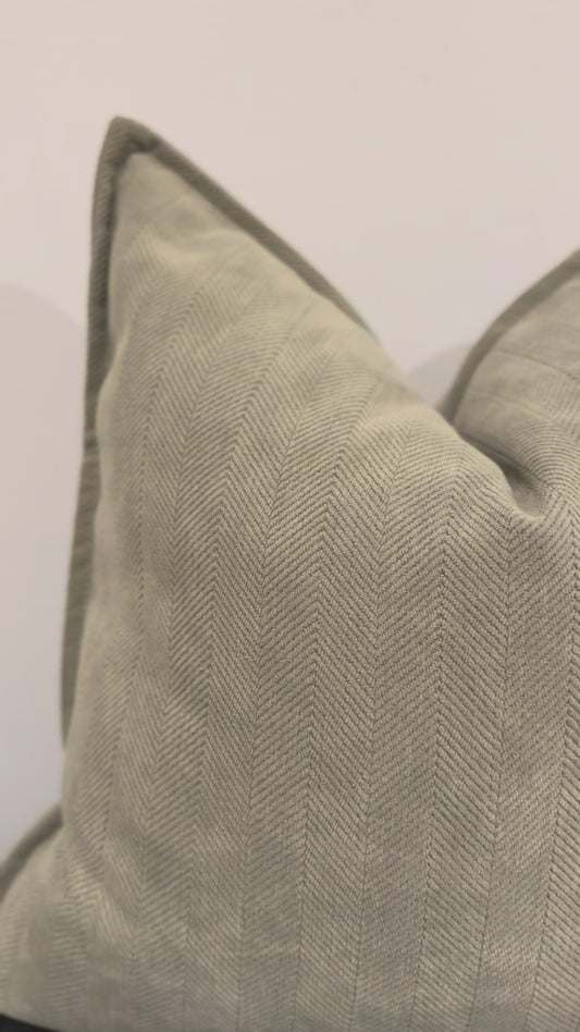 close up video Sagewood cushion showing linen texture.
