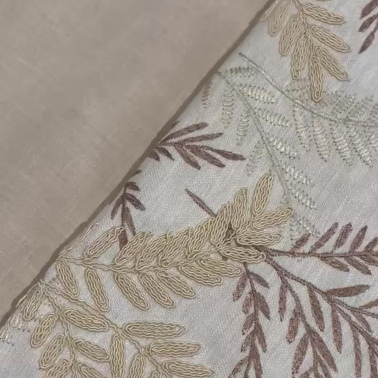 video of Champagne Gold Cushion fabric along with other fabrics