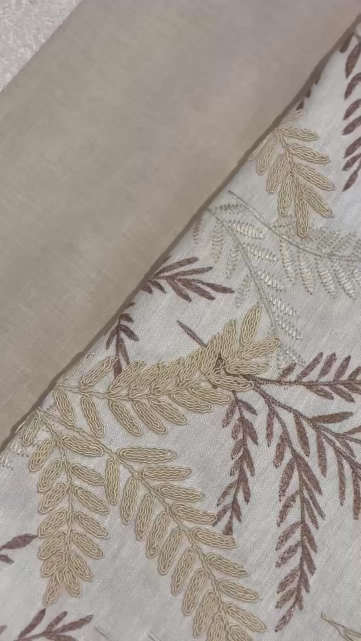 video of Champagne Gold Cushion fabric along with other fabrics