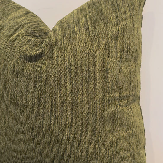 Close up olive green cushion fabric texture detail