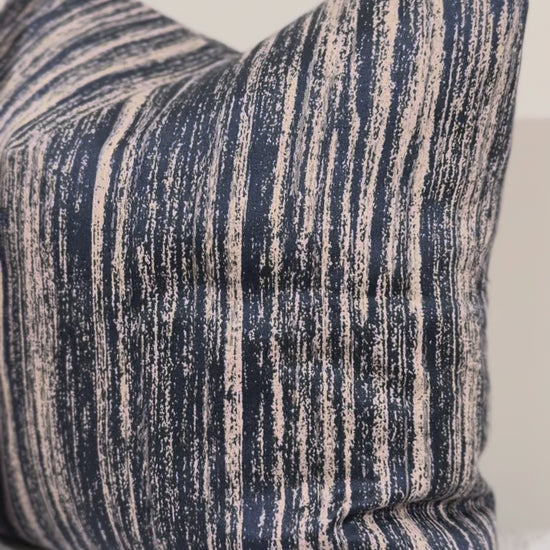Video of Midnight Sand Cushion showing navy and beige painterly linear design | interiors by zai