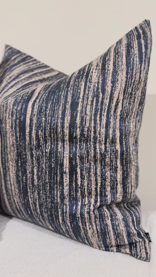 Video of Midnight Sand Cushion showing navy and beige painterly linear design | interiors by zai