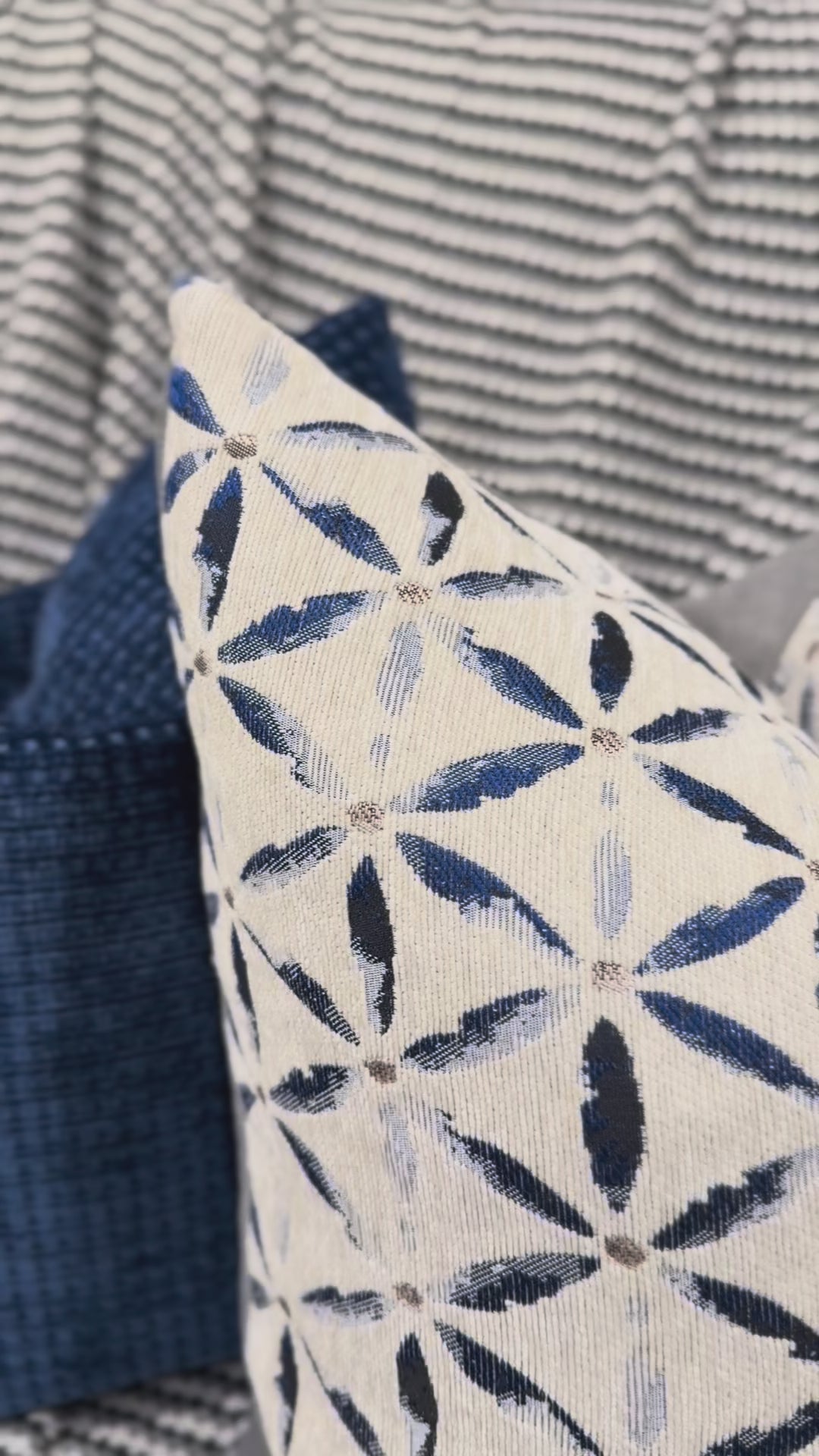 Video close up of cushion showing textured geometric detail.